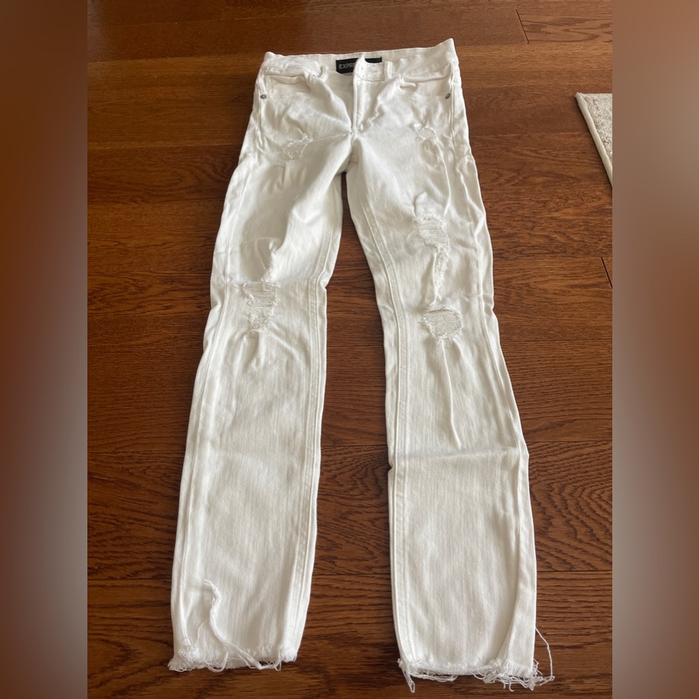 Ripped white skinny jeans